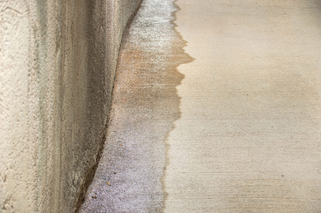 Foundation leak on concrete home with water caused by heavy rains | Schol's Concrete and Excavation Services in Chilliwack, British Columbia
